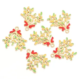 Detailed shot of Christmas mistletoe enamel alloy charms pendants DIY jewelry accessories.