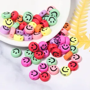 Acrylic smiley face round beads detail shot, colorful DIY craft supplies for custom bracelets.
