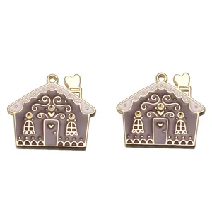 Close-up of gingerbread house alloy enamel charms, perfect for DIY jewelry and crafts.