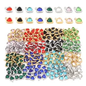 Crystal heart pendants for DIY jewelry making and necklaces with metal rims in various colors.