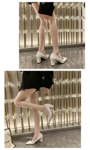 Elegant white pointed-toe chunky heel pumps detail shot, stylish and comfortable footwear design.