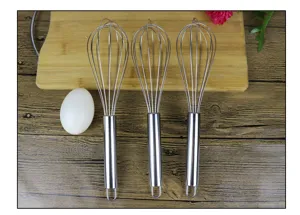 Stainless steel manual wire whisk kitchen egg beater tool set for baking cooking and mixing.