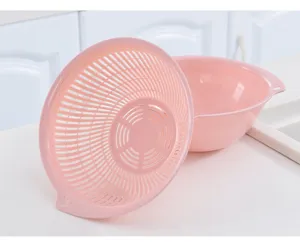 Cesta de drenaje de plástico de doble capa rosa, práctico lavabo de cocina para frutas.