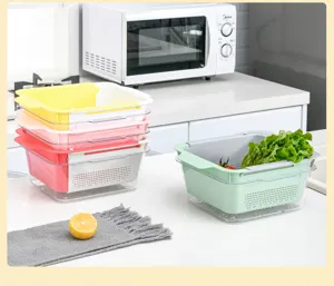 Adjustable kitchen sink drain basket, double-layer fruit vegetable colander detail view.