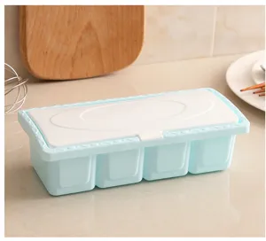 Close-up detail view of the 4-compartment plastic kitchen seasoning box with dust cover.