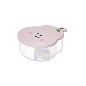Transparent pear-shaped divided food storage box cute fruit bento box with a small spoon.