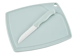 Ceramic fruit knife and cutting board set, sharp kitchen tool for slicing fruits safely.