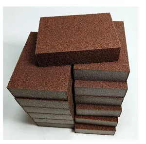 Corundum cleaning sponge block for heavy duty rust removal and kitchen cookware cleaning.