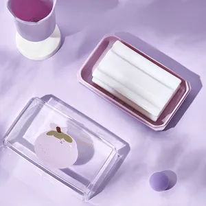 Transparent soap dish with lid and draining tray, portable plastic soap holder for bathroom.