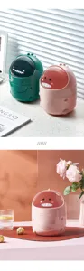 Cute dinosaur desktop trash can and storage bucket with flip cover, creative plastic pen holder.