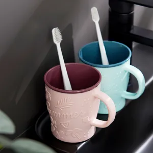 Bicchiere porta spazzolino in plastica goffrata bicolore con manico per casa e viaggi