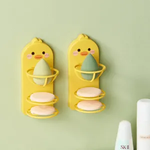 Süßer gelber Enten Wand-Make-up-Schwammhalter Set mit Ablagekörben für Kosmetikschwämme.