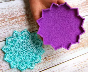 Mandala resin coaster silicone mold set with intricate floral pattern for DIY crafting.