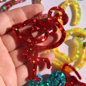 Red glitter flamingo resin craft detail, sparkling animal bookmark pendant charm accessory.
