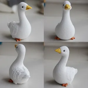 White goose figurine ornament detail view, cute duck statue for home decor and crafts.