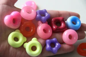 Colorful resin donut and star pendants charms DIY cute accessories close up detail display