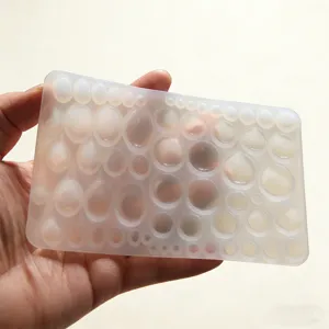 Silikonform für kleine runde und ovale Cabochons, ideal für Harzgießen und Basteln.