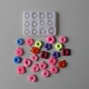 Silicone mold set with cute colorful donut, bear, and star resin pendant charms for DIY crafts.