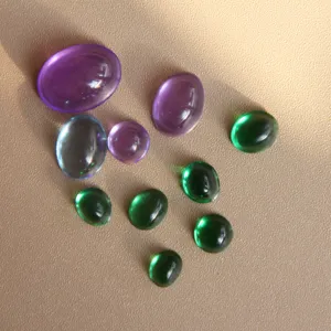 Smooth oval cabochon stones and resin drops for ring and pendant DIY crafts decoration.