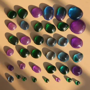 Colorful irregular round resin gemstone cabochons for DIY jewelry making and craft decor.
