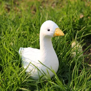 Detailed shot of a cute 3D white goose figurine, perfect for garden and home decoration.