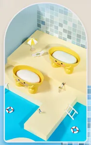 Close-up detail of the cute yellow duck bathtub soap dish in a creative miniature pool scene.