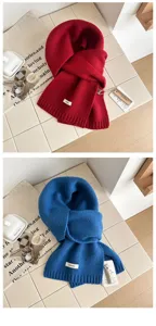 Details of pure wool knitted warm scarf in solid color, cozy winter fashion accessory.