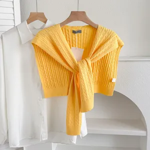 Women cable knit yellow shawl sweater scarf layered with white shirt top elegant fashion