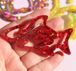 Red glitter resin bookmark craft detail shot, handmade cute animal epoxy bookmark mold item.