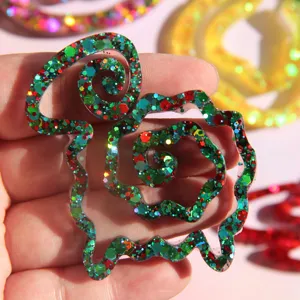 Detailed close-up view of the glittering resin sheep craft showing sparkling flakes.