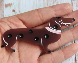 Dachshund shaped acrylic charm accessory, cute puppy pendant for DIY crafts and jewelry.