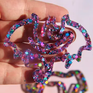 Glitter resin dragon bookmark craft handmade sparkly shiny cute fantasy accessory piece.