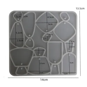 Silicone mold detail showing dimensions and various geometric earring pendant cavities clearly.