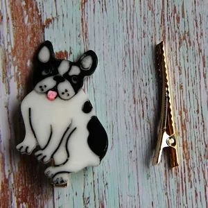 Cute French bulldog hair clip and gold alligator clip set, stylish resin accessory.