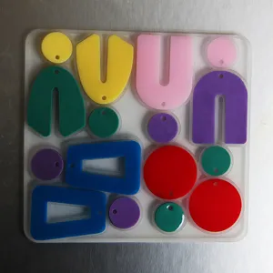 Geometric silicone mold for DIY epoxy resin earrings, multi-shape handmade pendant craft tool.