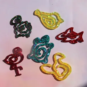 Glitter resin animal shapes detail view, cute bookmark mold accessories for DIY crafts and decor.