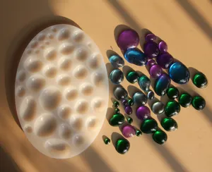 Detailed view of 3D gemstone silicone mold with colorful resin cabochons for DIY crafts.