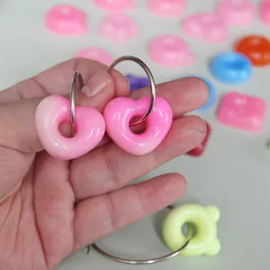 Cute pink heart donut resin pendant charms with metal rings for DIY jewelry making crafts.