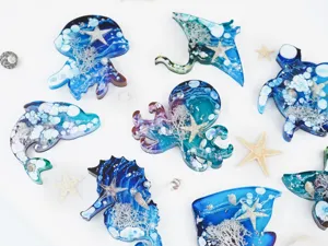 Resin ocean animal mold detail featuring detailed jellyfish octopus turtle seahorse with waves.