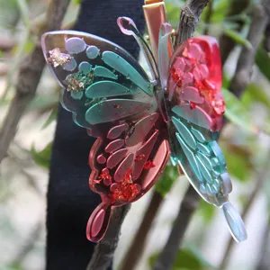 Gradient resin butterfly hair clip with gold foil, stunning 3D design for daily or party wear.