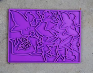Purple silicone mold detail showing intricate fairy silhouettes for epoxy resin DIY crafts.