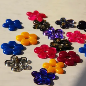 Colorful resin flower cabochons DIY jewelry making craft supplies closeup details charm display