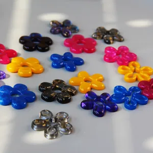 Colorful resin flower charms for DIY jewelry making, cute floral pendants, smooth surface.