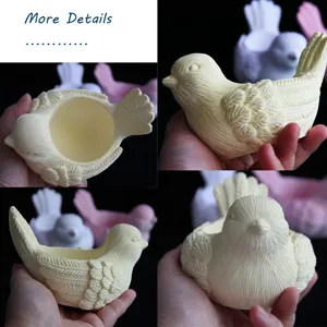 3D little bird container mold detail shot showing multi-angle resin or plaster craft designs.