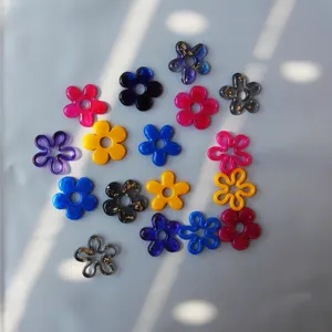 DIY resin flower charms for handmade jewelry making, colorful floral pendants details.