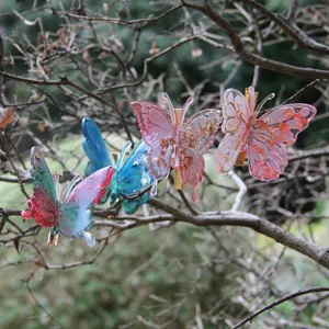 Exquisite 3d butterfly hair clip with vibrant resin colors and gold foil details for daily wear.