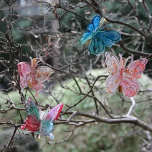 Resin butterfly hair clips and 3D garden decorative clips with gold foil colorful resin design.