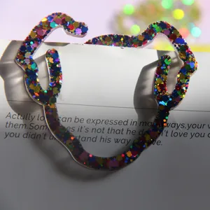 Glitter cat shape bookmark detail view, colorful resin paper clip for reading books.
