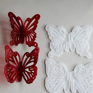 Gedetailleerd overzicht van de 3D vlinder siliconenmal en hars handwerk met hol ontwerp.