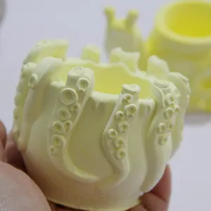 Detailed view of octopus tentacle storage jar mold, unique suction cup design texture craft.